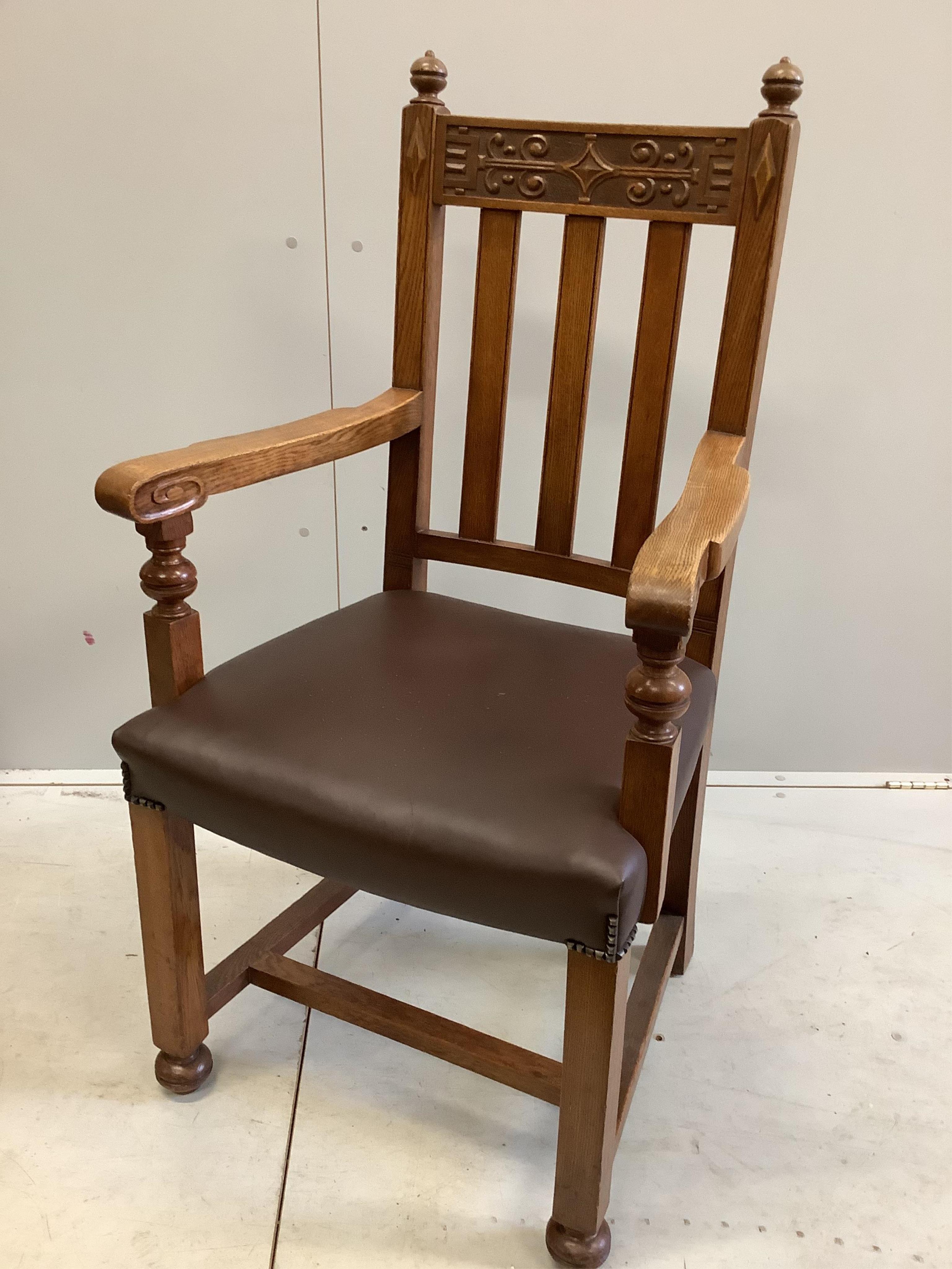 A set of eight early 20th century carved oak dining chairs, two with arms. Condition - fair to good